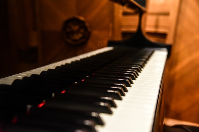 the keyboard of a grand piano
